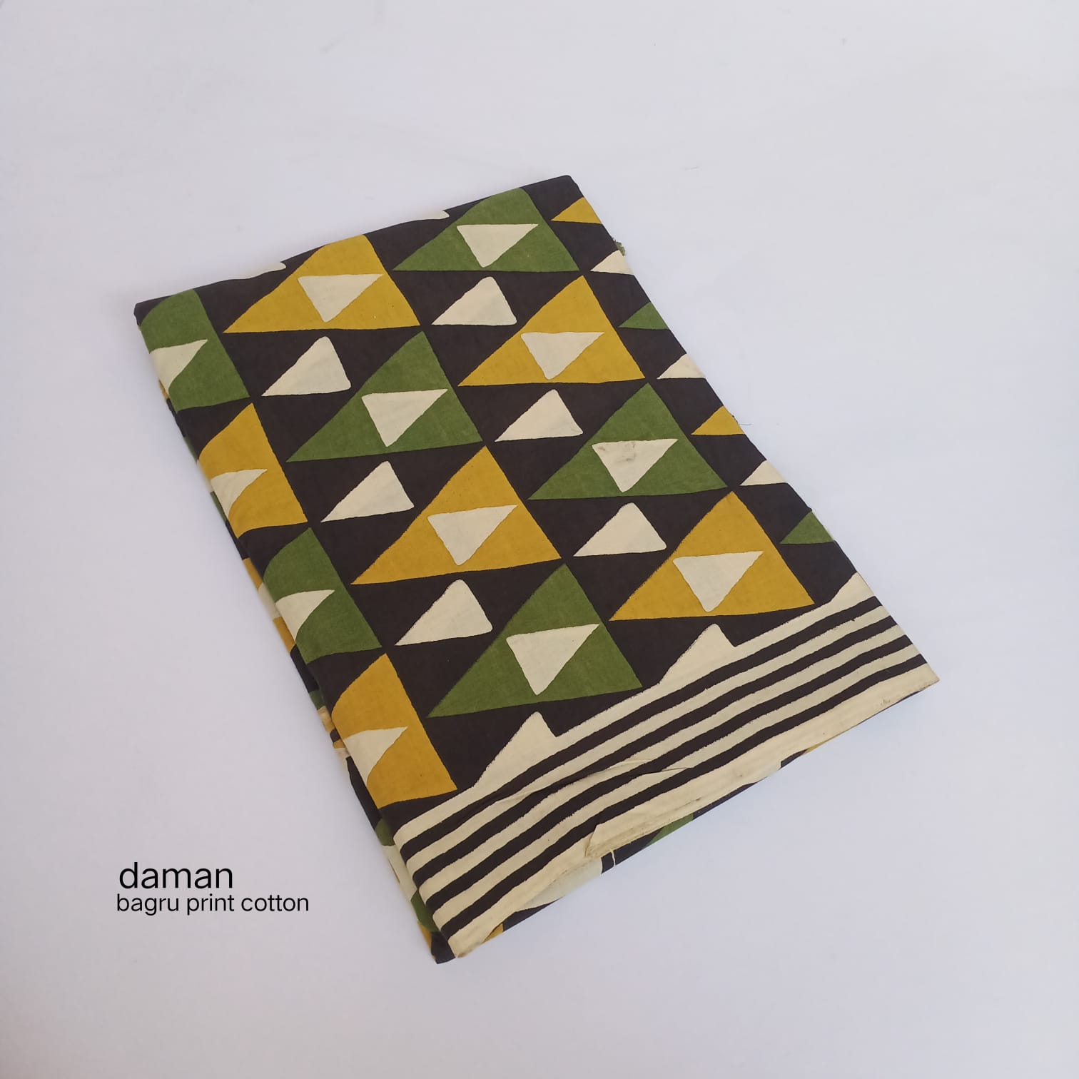 Mehendi green Bagru handblock cotton fabric with traditional daman border floral detailing, wholesale textile by Fabtexs